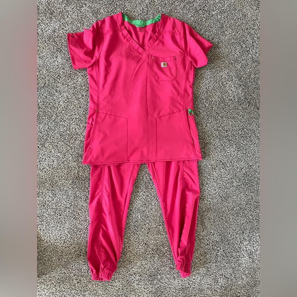 Woman’s Carhartt pink scrubs. Size small